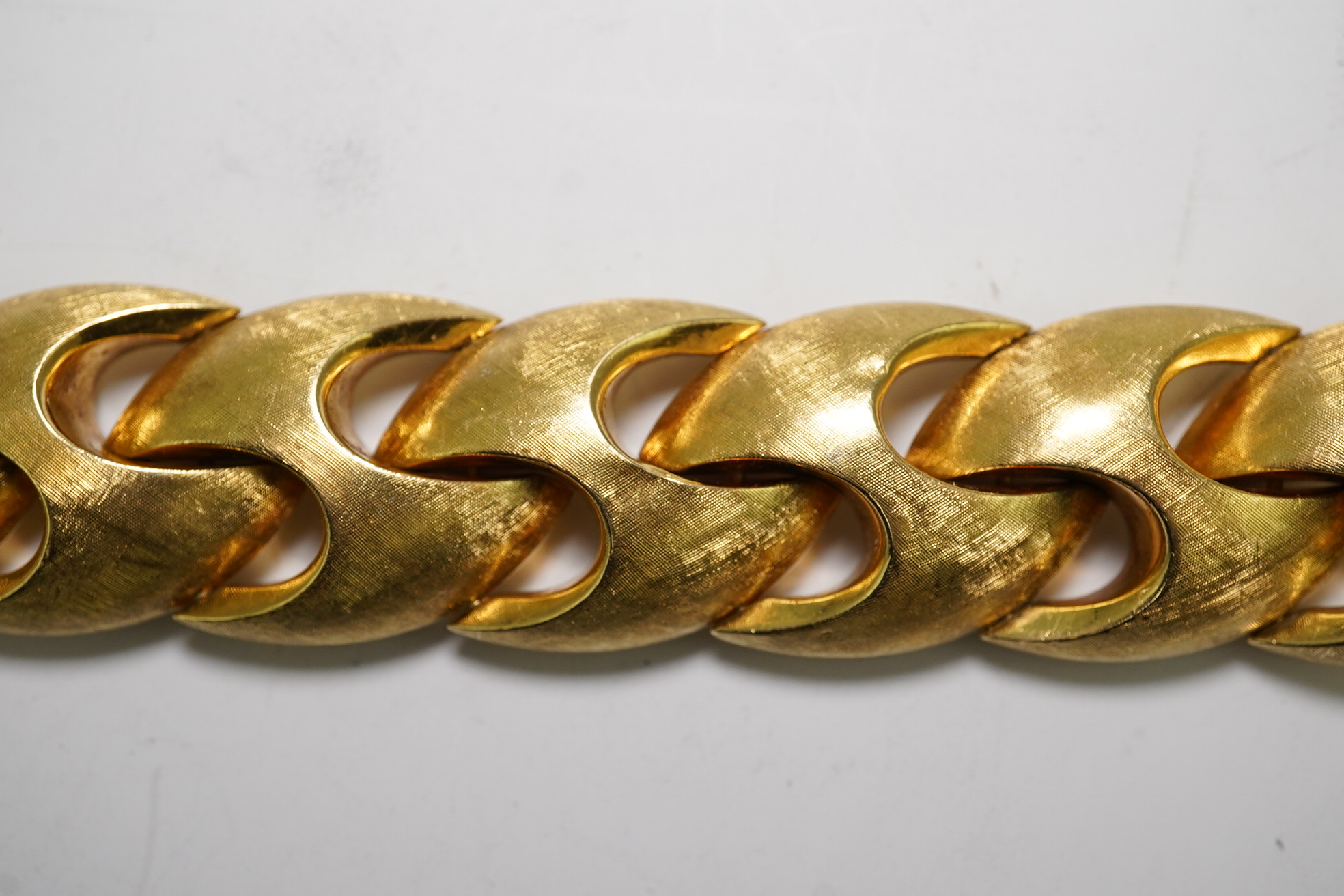 A stylish early 1970's brushed 18ct gold bracelet